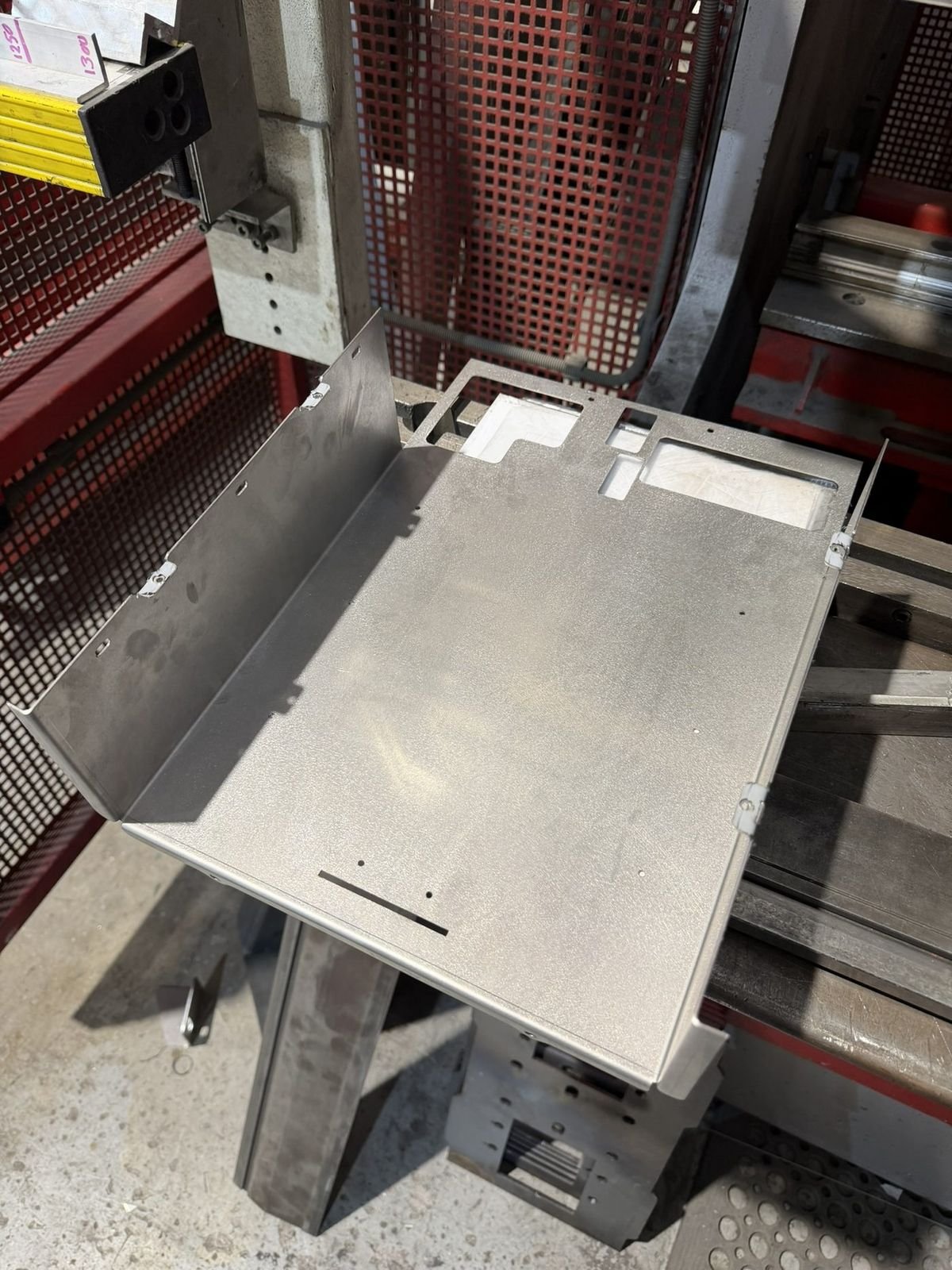 Press-formed enclosure shell, shop floor (photo 2 of 3)