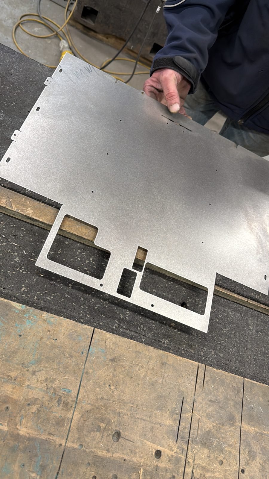 Press-formed enclosure shells on the shop floor (photo 2 of 3)
