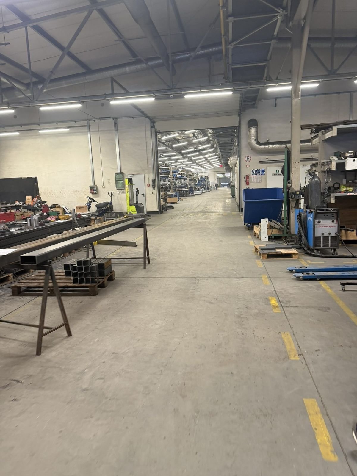 Structural steel stock ready for fabrication at a partner facility