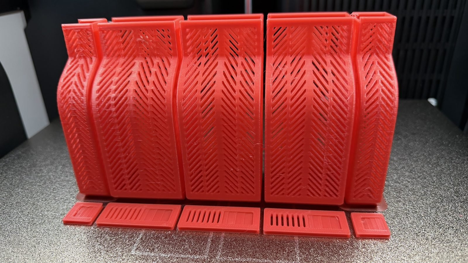 Batch of red reinforced-filament printed discs (photo 2 of 2)