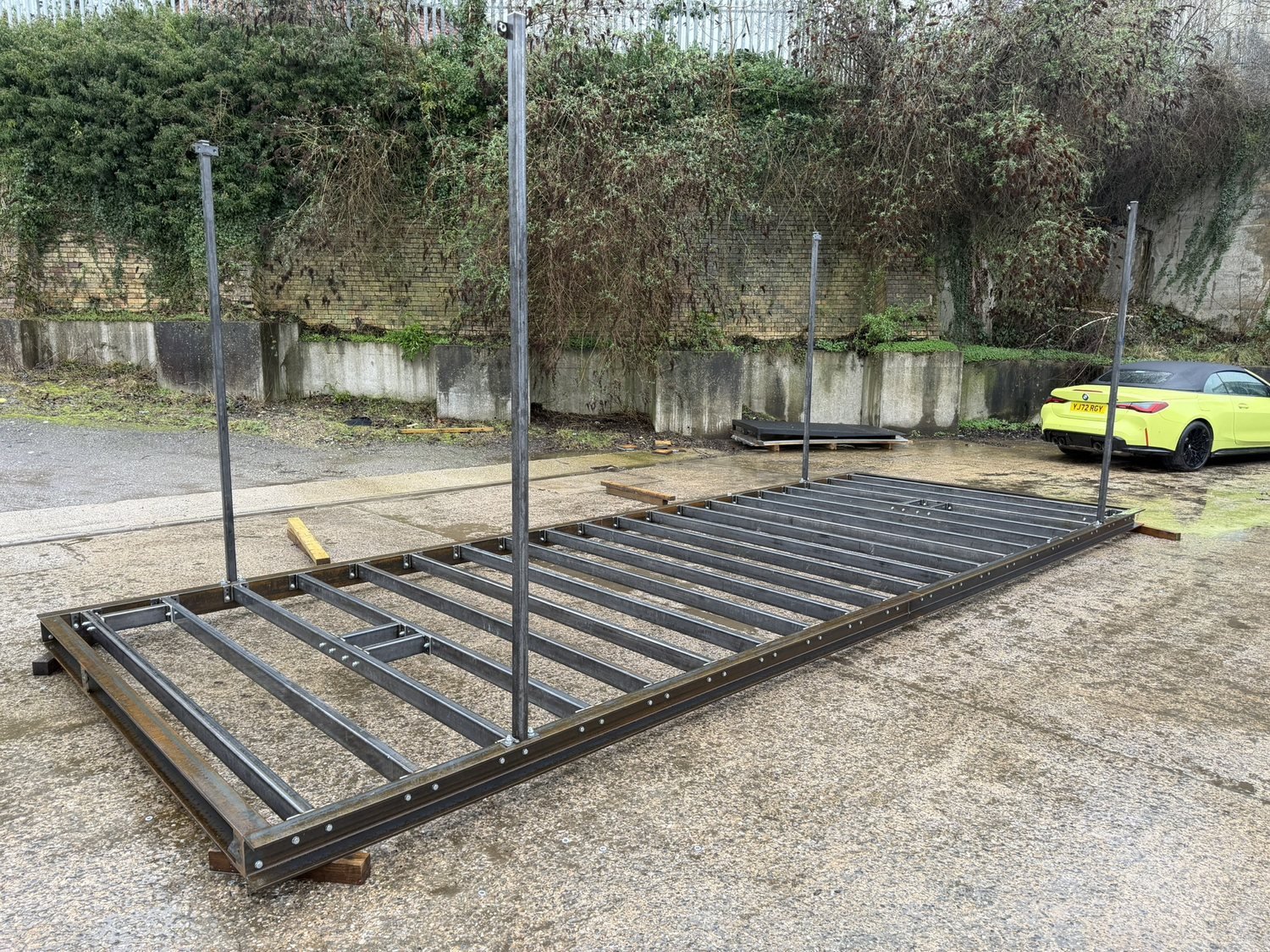 Modular steel frame components on the shop floor (photo 2 of 8)